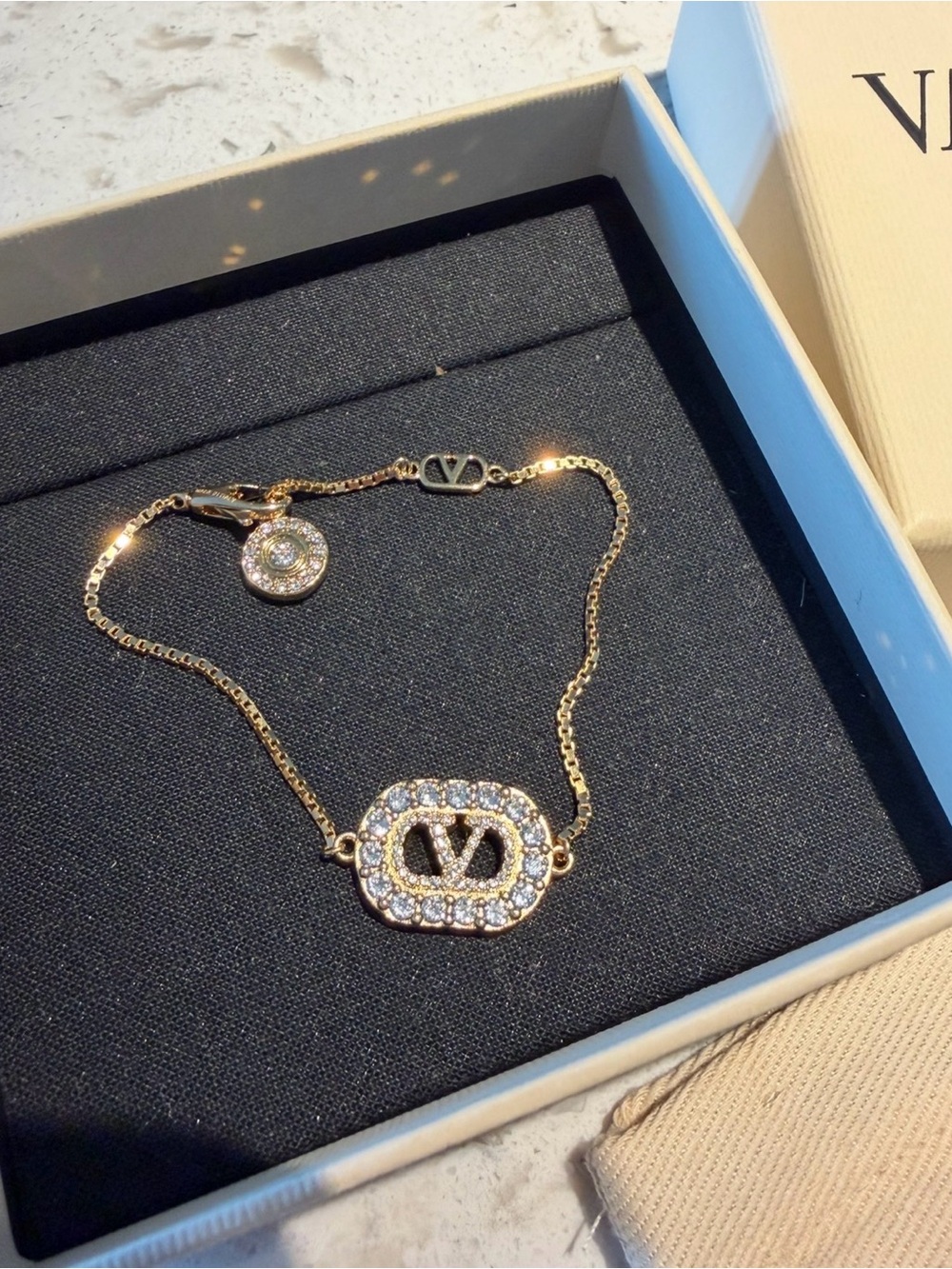 Valentino Garavani Gold-Tone Crystal V Logo Bracelet
